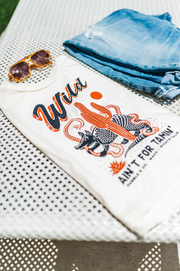 wild ain't for tamin' desert | cream boxy muscle tee
