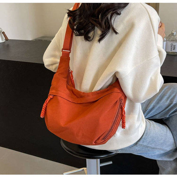 crossbody dumpling bag | orange