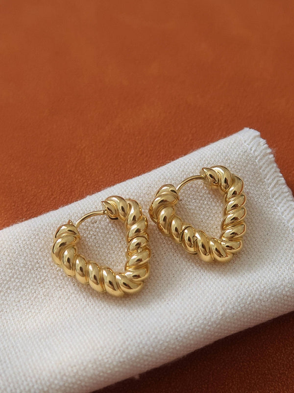 twisted heart hoop earring | 18k gold