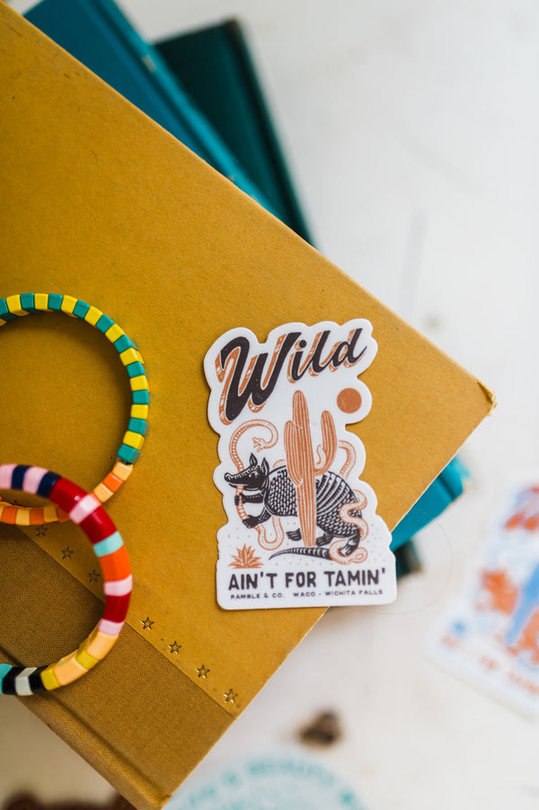 wild ain't for tamin' tan + charcoal | sticker