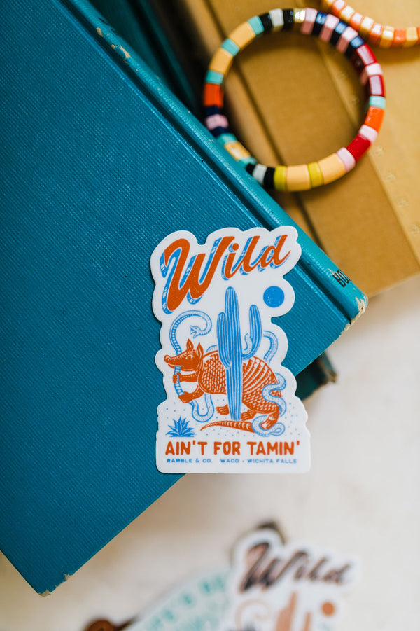 wild ain't for tamin' blue + red | sticker