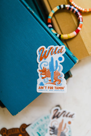 wild ain't for tamin' blue + red | sticker