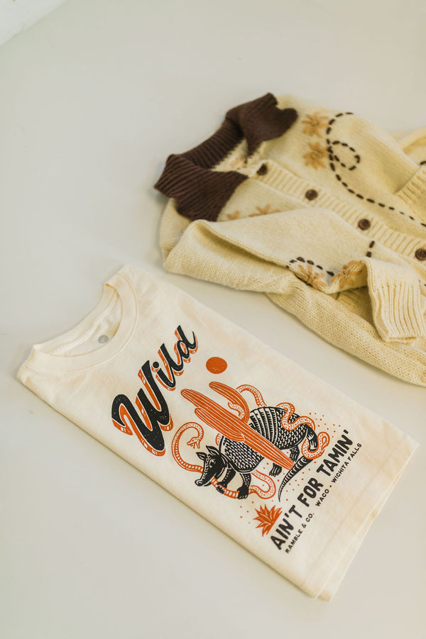 wild ain't for tamin' desert | cream boxy muscle tee