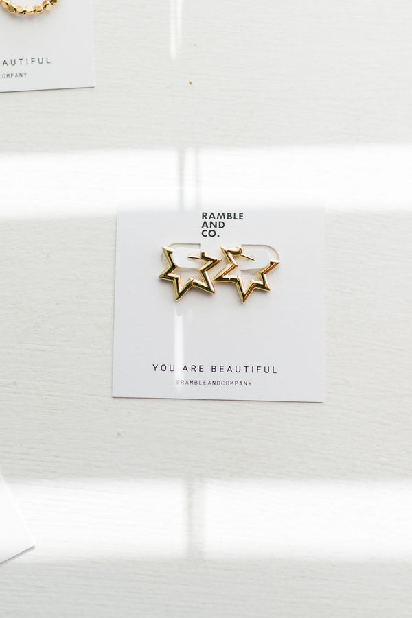 gold star huggie 14k | earring