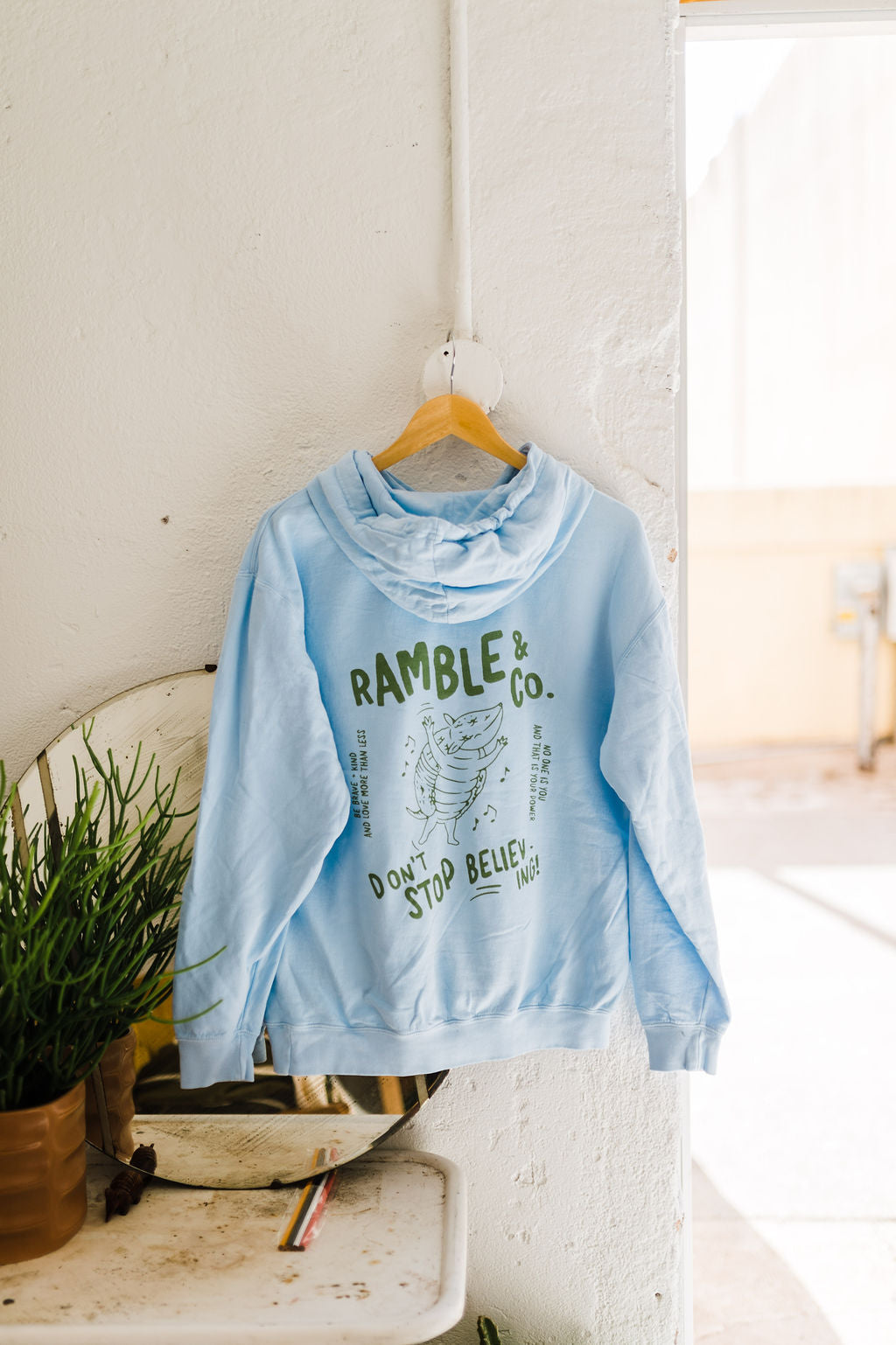 don't stop believing armadillo | hydrangea lightweight comfort colors hoodie