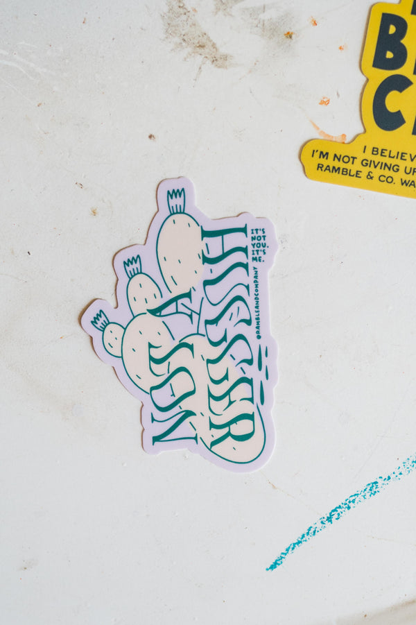 not a hugger lilac + green | sticker