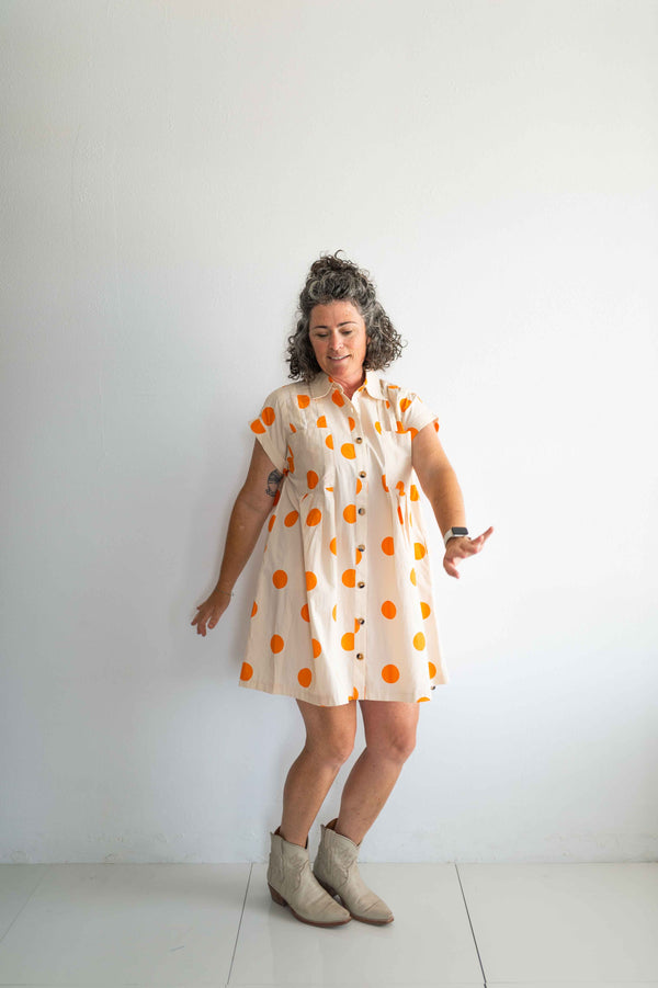 polka dot pleated poplin mini dress | cream + orange