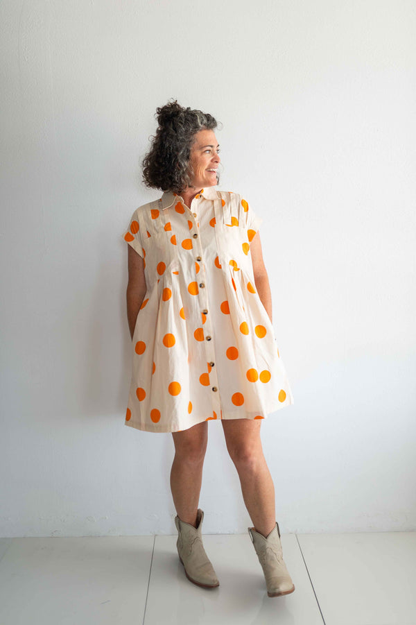 polka dot pleated poplin mini dress | cream + orange