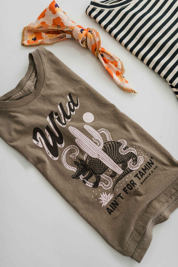 wild ain't for tamin' desert | faded brown boxy muscle tee