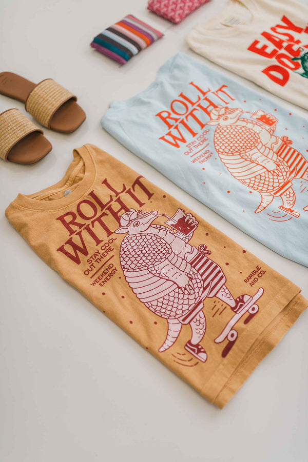 roll with it armadillo | faded mustard boxy muscle tee