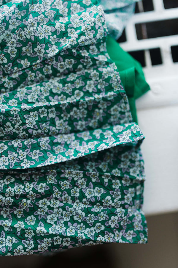 pleated ditsy floral midi skirt | green + white