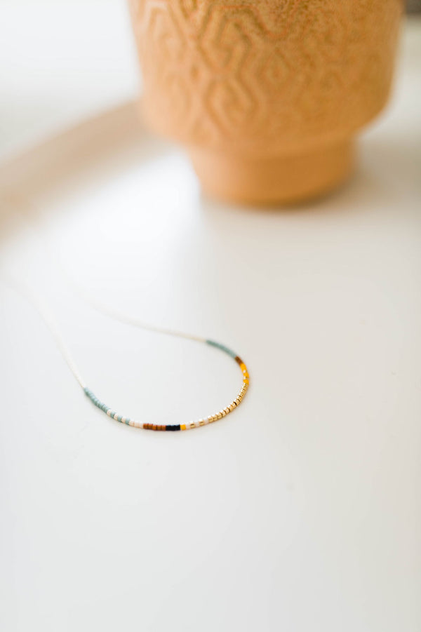 thin beaded necklace | sky