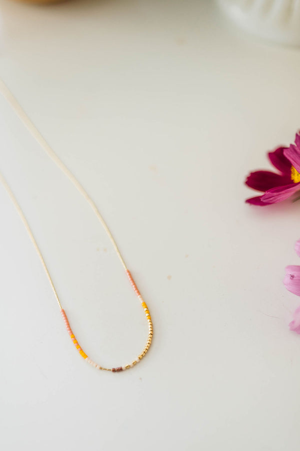 thin beaded necklace | sunrise
