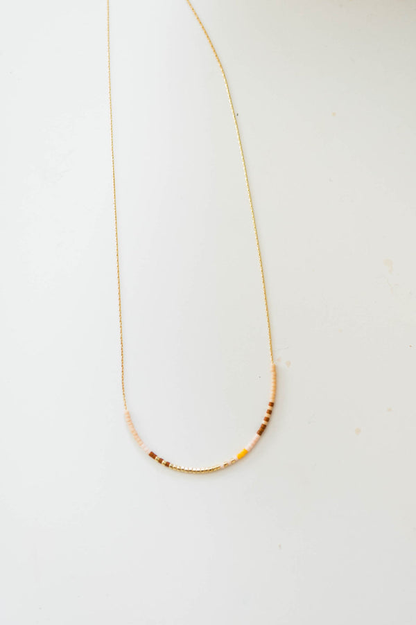 thin beaded necklace | sand