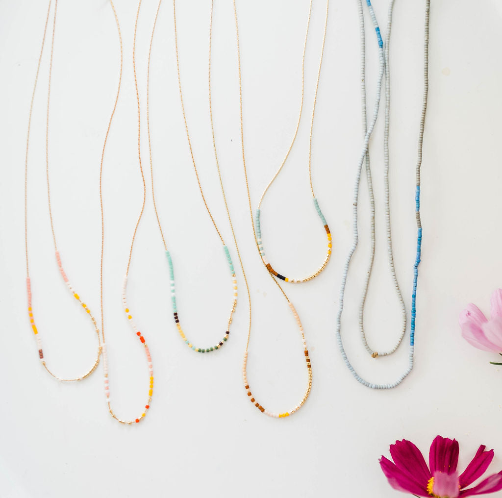 thin beaded necklace | sand