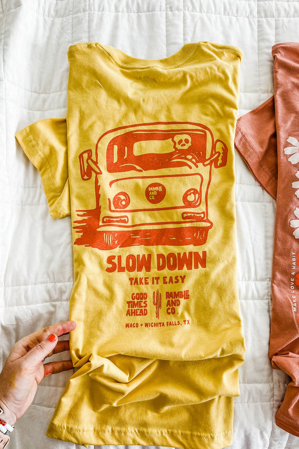 slow down | maize yellow tee