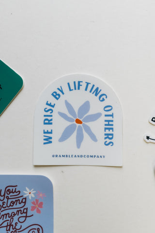 we rise by lifting others flower | sticker