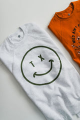 tx smiley | grey raglan crewneck