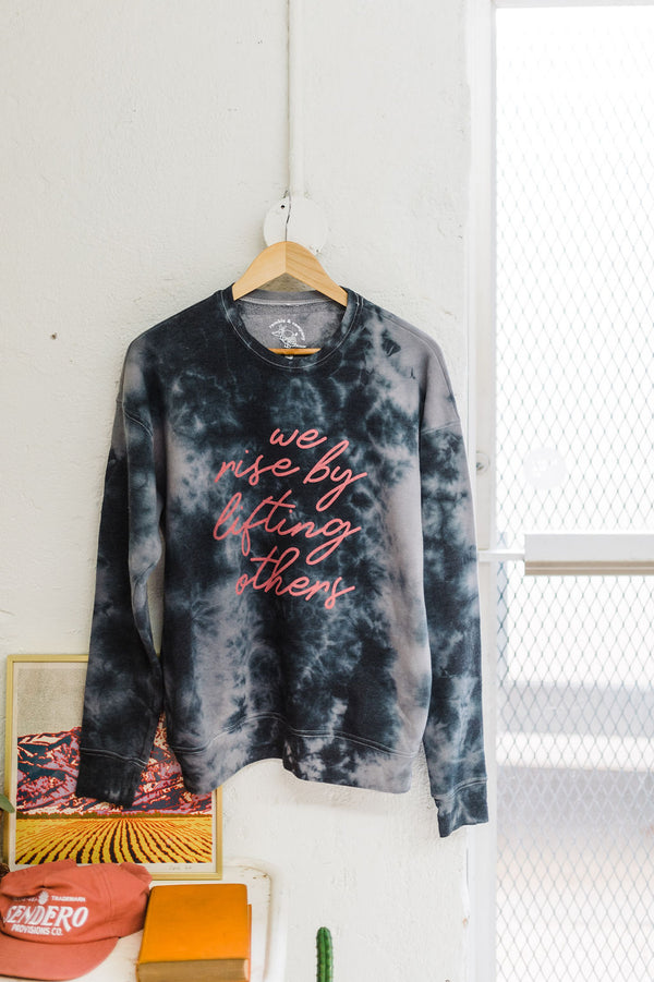 we rise by lifting others | black tie dye fleece crewneck