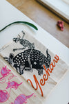 yeehaw skeleton + armadillo | tea towel