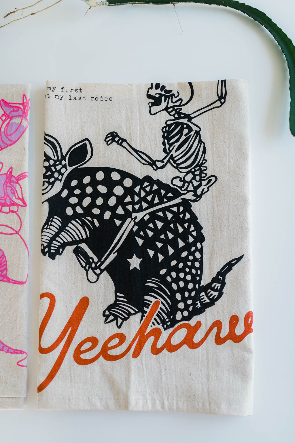 yeehaw skeleton + armadillo | tea towel