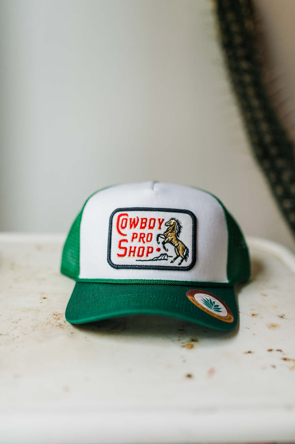 cowboy pro shop |  white and green