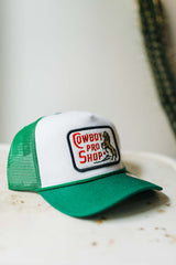 cowboy pro shop |  white and green