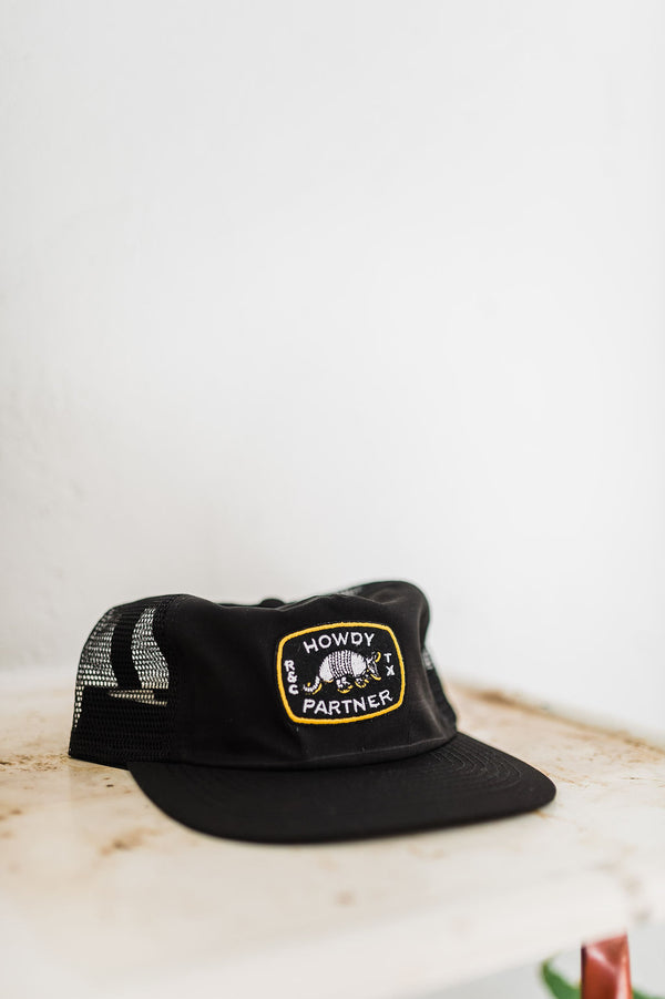 howdy partner armadillo | black nylon field trip trucker hat