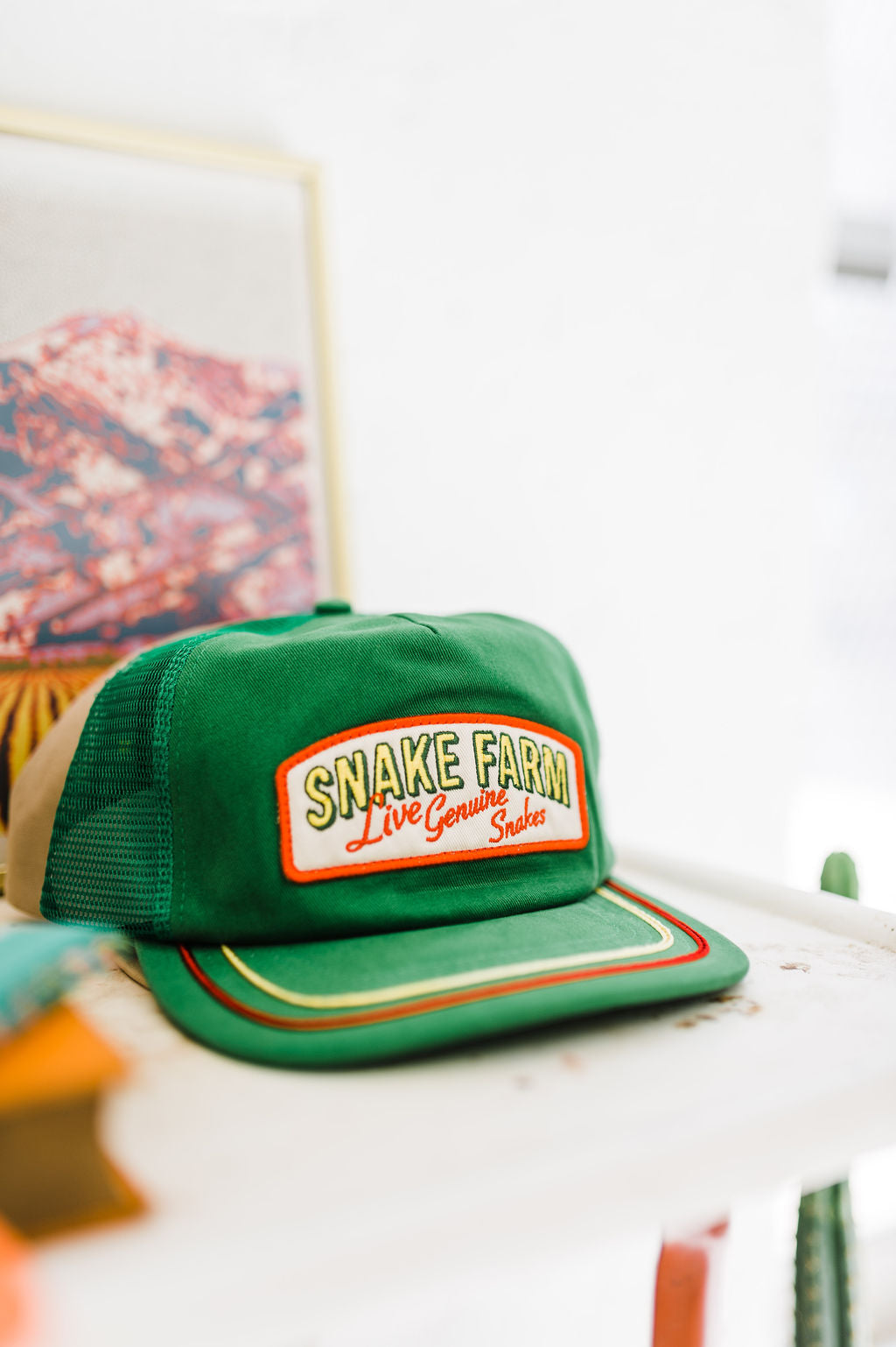 snake farm | green hat