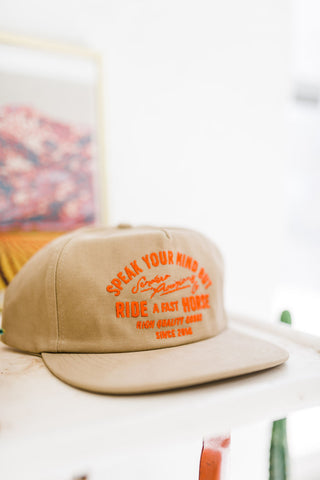 fast horse | tan + orange hat