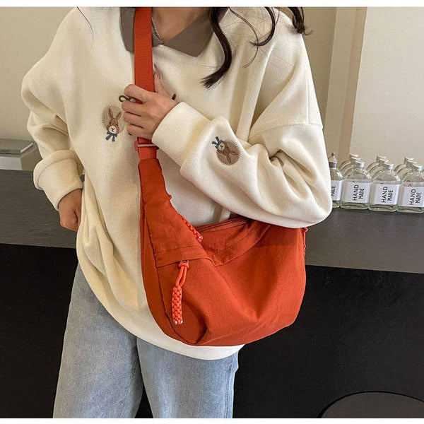 crossbody dumpling bag | orange