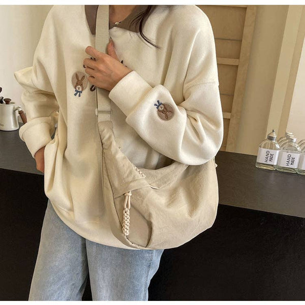 crossbody dumpling bag | cream