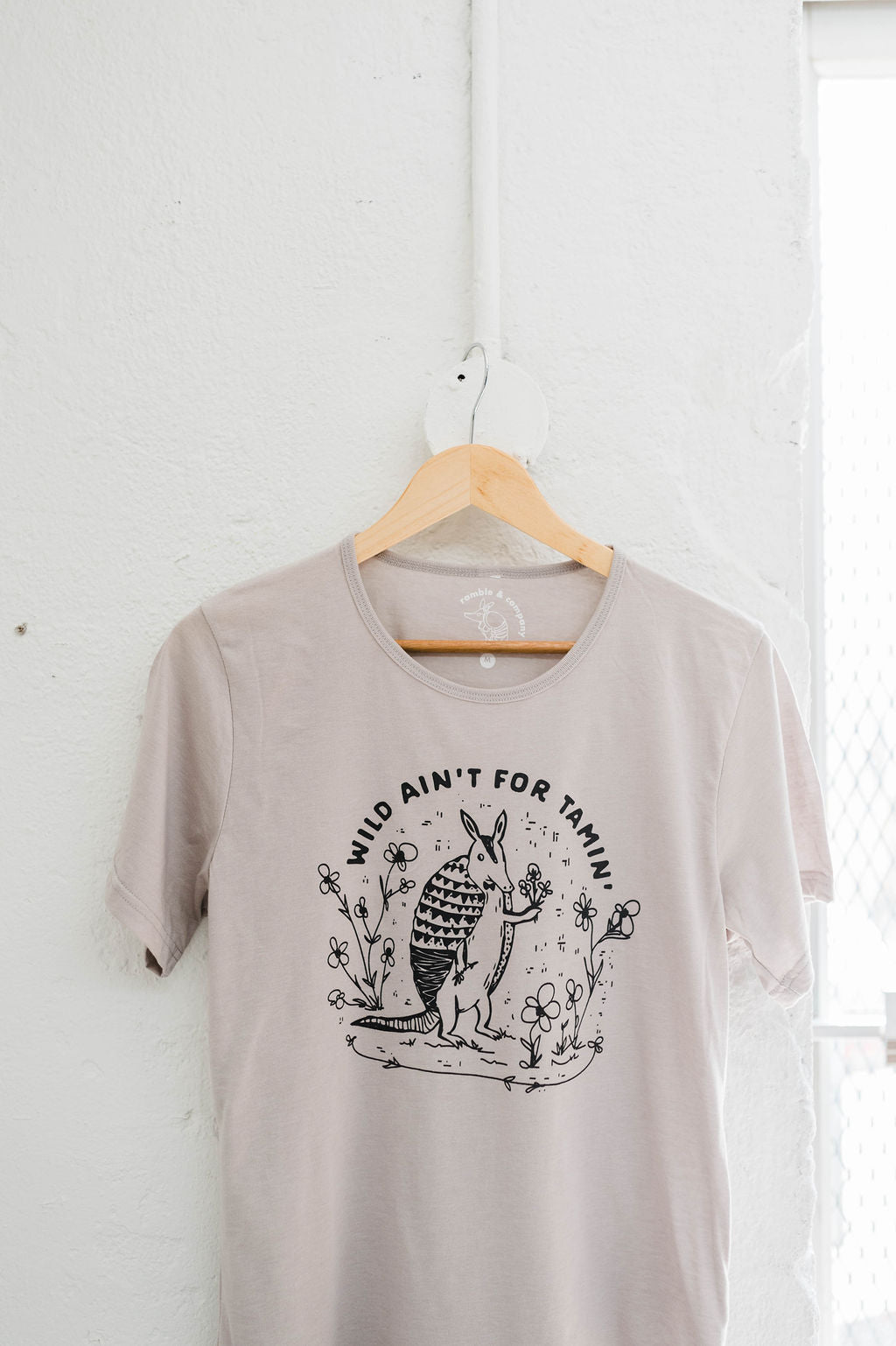 wild ain't for tamin' | silver curved hem tee