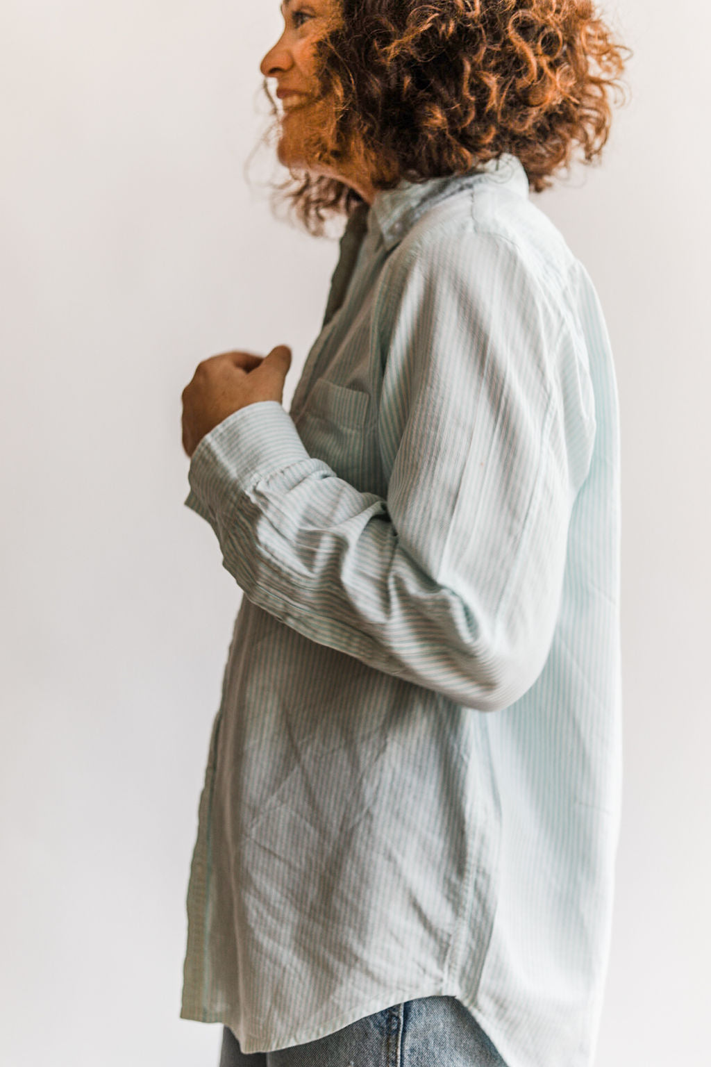 the color: white and blue tint stripes Our Button Up: 100% cotton fabric in our custom stripe. Color ways: puffin's bill and blue tint! Designed to fit like your favorite mens vintage shirt, but with a more feminine take. 100% cotton | one chest pocket sizing: ﻿runs true to size. Ramble & Co. is a family owned business. Shop at shop.rambleandcompany.com or visit our store in Wichita Falls, Texas || small batch/ hand printed tees + fine art prints | your source of encouragement + inspiration.