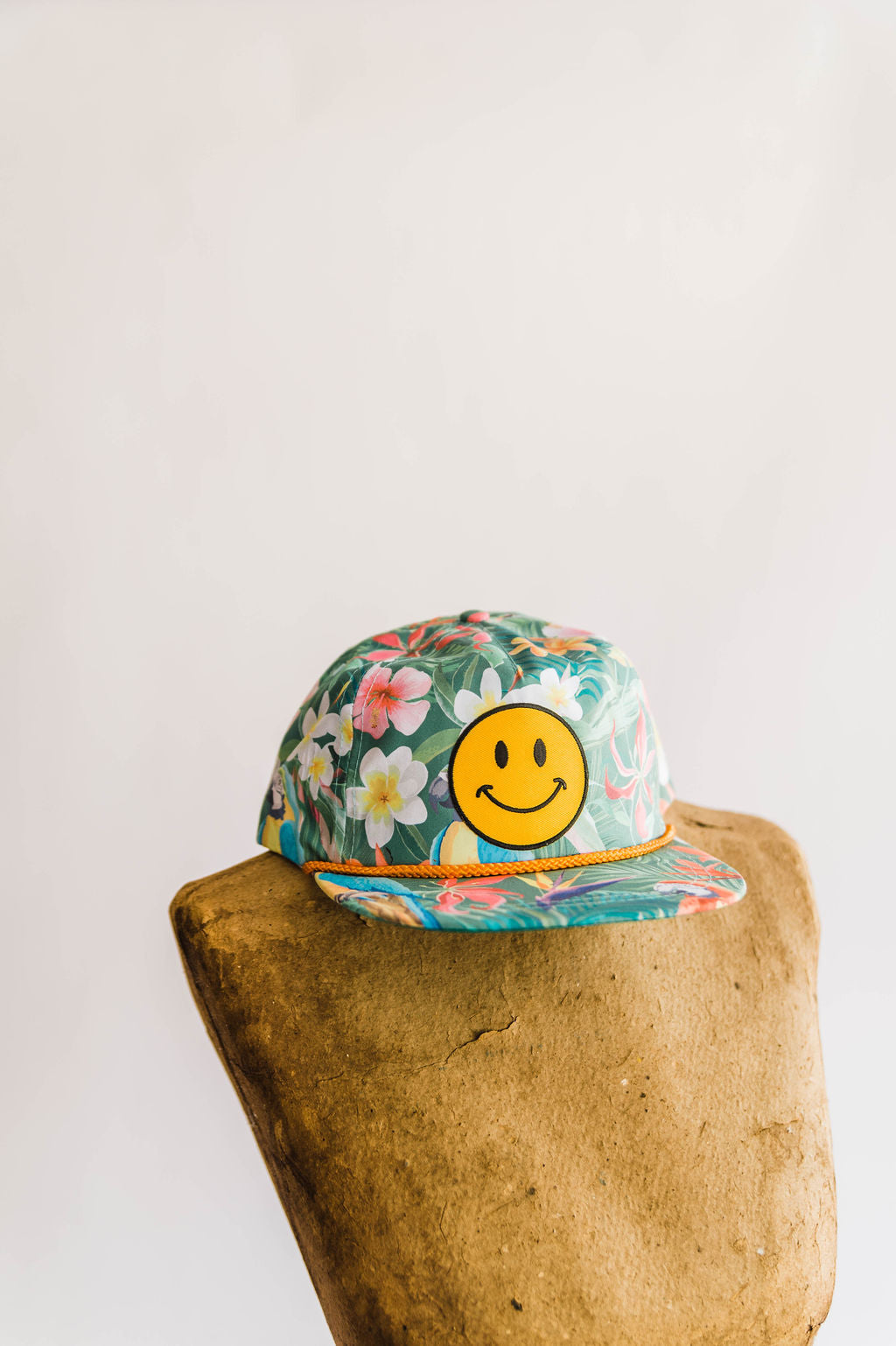 the design: the world needs what you got + ramble & co.  the color: rainforest pattern hat teal "the world needs what you got" patch  about the hat:  100% cotton twill Five panels Low profile pro-style crown Fused buckram-backed front panel Matching sewn eyelets  Plastic snap size adjuster