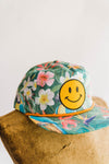 the design: the world needs what you got + ramble & co.  the color: rainforest pattern hat teal "the world needs what you got" patch  about the hat:  100% cotton twill Five panels Low profile pro-style crown Fused buckram-backed front panel Matching sewn eyelets  Plastic snap size adjuster