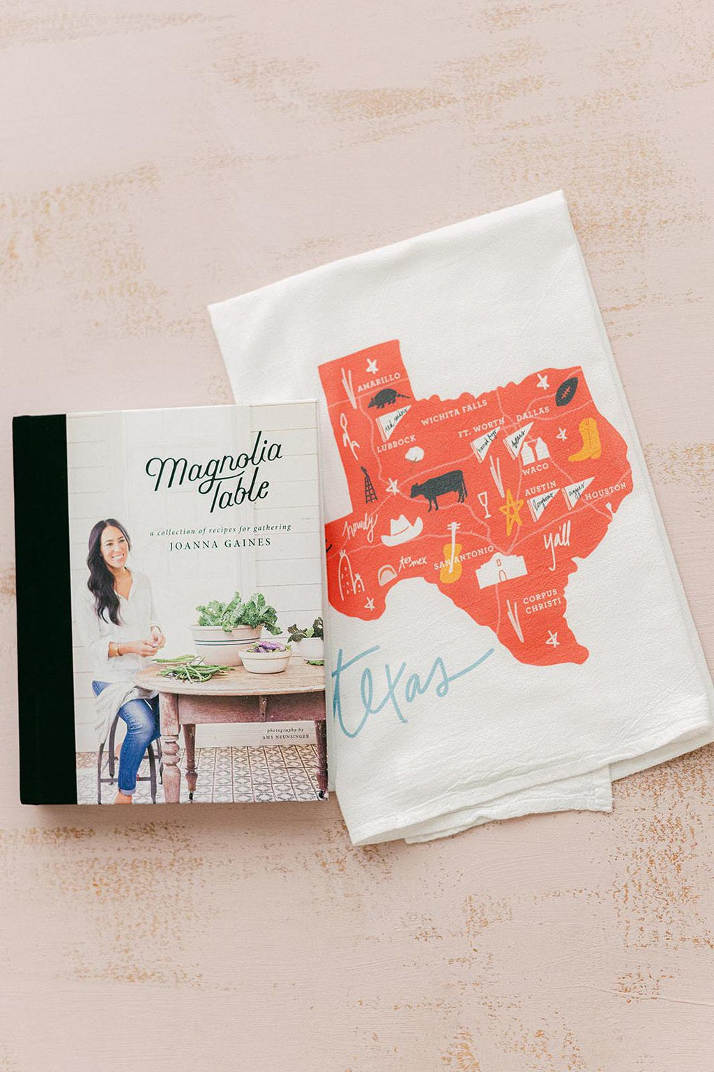 White flour sack towel with state of texas design with texas cities in a 5 color design by Doe a Deer Designs || you can shop now at  shop.rambleandcompany.com or visit our storefront in downtown Wichita Falls, Texas || small batch + hand printed tees | home goods | paper goods | gifts + more