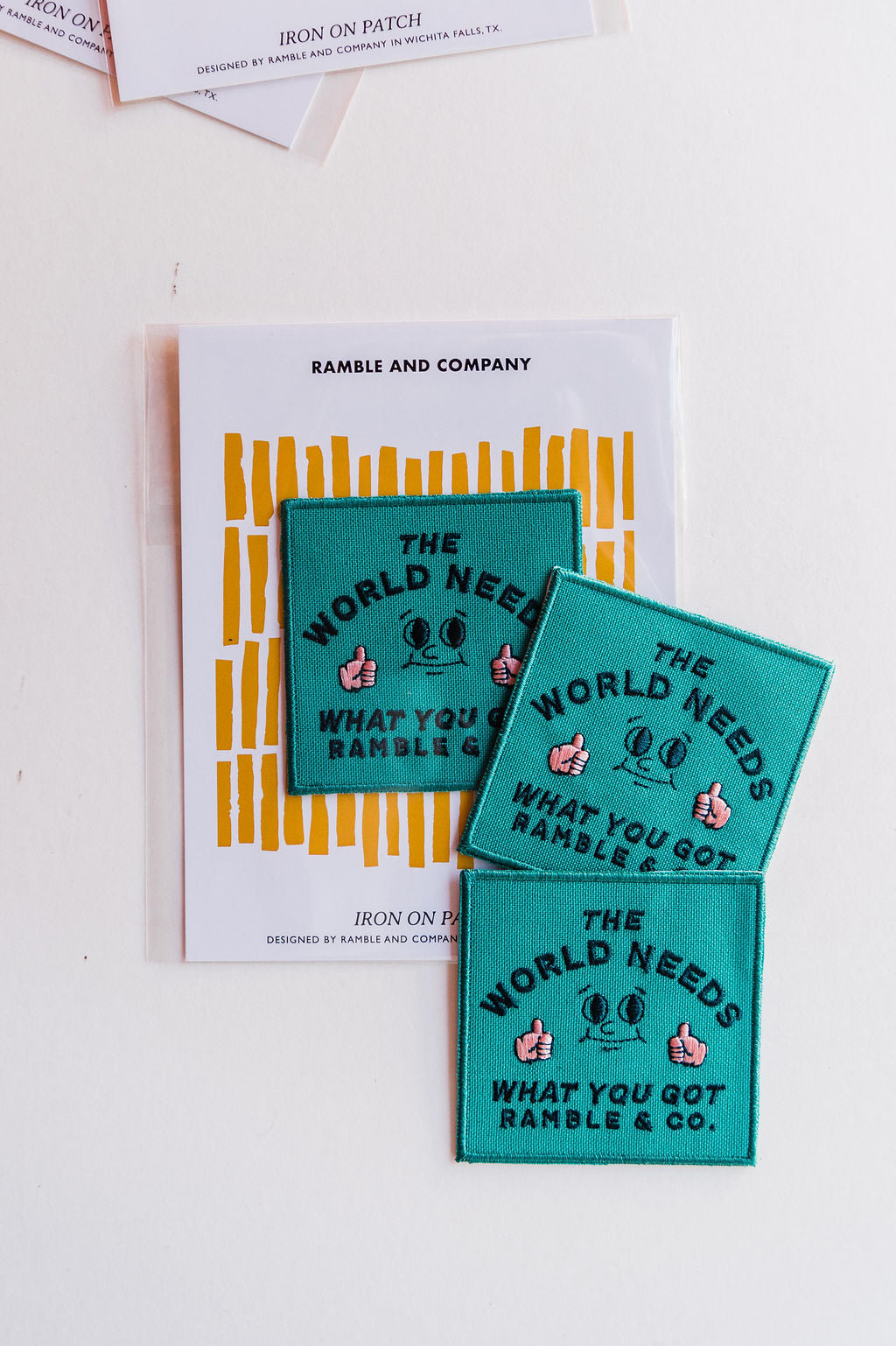 the design: the world needs what you got  the color: teal, black, and blush  approx. 2.5" x 2.5"  To apply:  Each patch is woven with an iron on backing. Hand stitching the patch around the edge will double ensure the longevity of the patch placement. Ramble & Co. is a family owned business. Shop at shop.rambleandcompany.com or visit our store in Wichita Falls, Texas || small batch/ hand printed tees + fine art prints | your source of encouragement + inspiration.