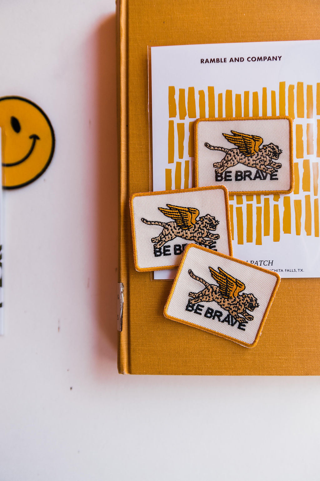 So many possibilities + ways to use these one-of-a-kind Ramble & Co. patches. the design: be brave the color: cream and black background  aprox. 2" x 2.5" To apply: Each patch is woven with an iron on backing.   Ramble & Co. is a family owned business. Shop at shop.rambleandcompany.com or visit our store in Wichita Falls, Texas || small batch/ hand printed tees + fine art prints | your source of encouragement + inspiration.