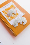 the design: blue armadillo the color: white and blue details aprox. 2" x 2" To apply: Each patch is woven with an iron on backing.   Ramble & Co. is a family owned business. Shop at shop.rambleandcompany.com or visit our store in Wichita Falls, Texas || small batch/ hand printed tees + fine art prints | your source of encouragement + inspiration.