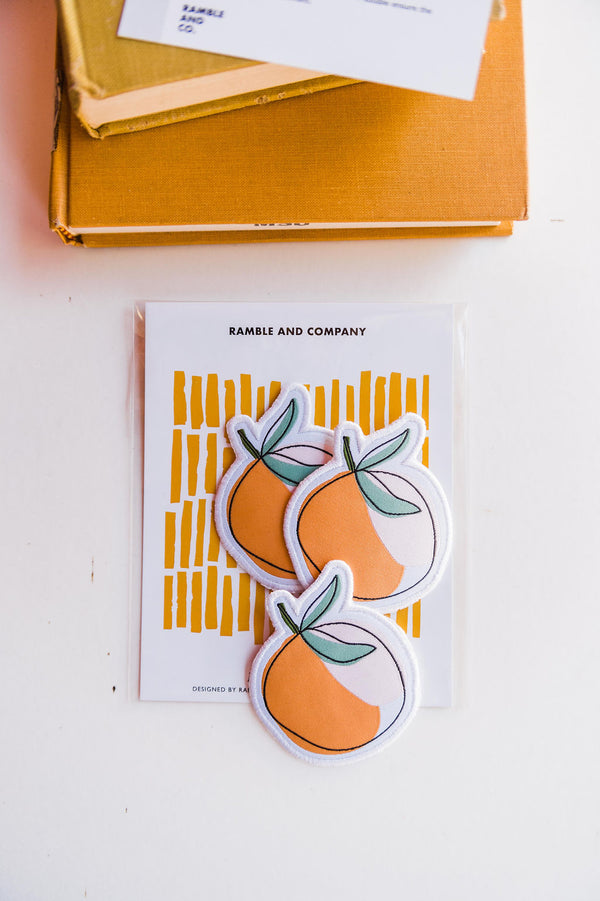 So many possibilities + ways to use these Ramble & Co. patches. multi-color hand illustrated peach the color: peach, pink, white, black and green approx. 2" x 2" To apply: Each patch is woven with an iron on backing. Ramble & Co. is a family owned business. Shop at shop.rambleandcompany.com or visit our store in Wichita Falls, Texas || small batch/ hand printed tees + fine art prints | your source of encouragement + inspiration.