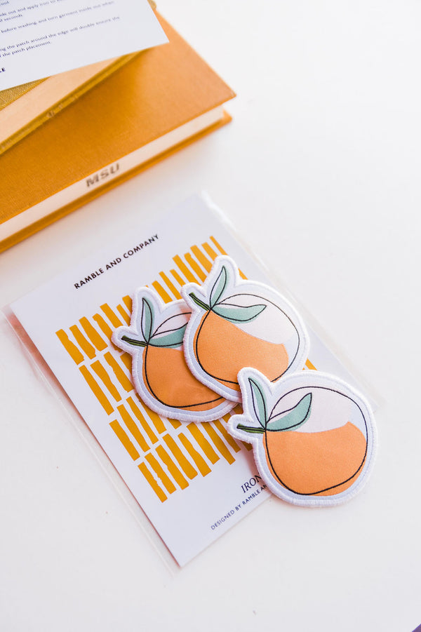 So many possibilities + ways to use these Ramble &amp; Co. patches. multi-color hand illustrated peach  the color: peach, pink, white, black and green  approx. 2&quot; x 2&quot; To apply:  Each patch is woven with an iron on backing. Ramble &amp; Co. is a family owned business. Shop at shop.rambleandcompany.com or visit our store in Wichita Falls, Texas || small batch/ hand printed tees + fine art prints | your source of encouragement + inspiration.