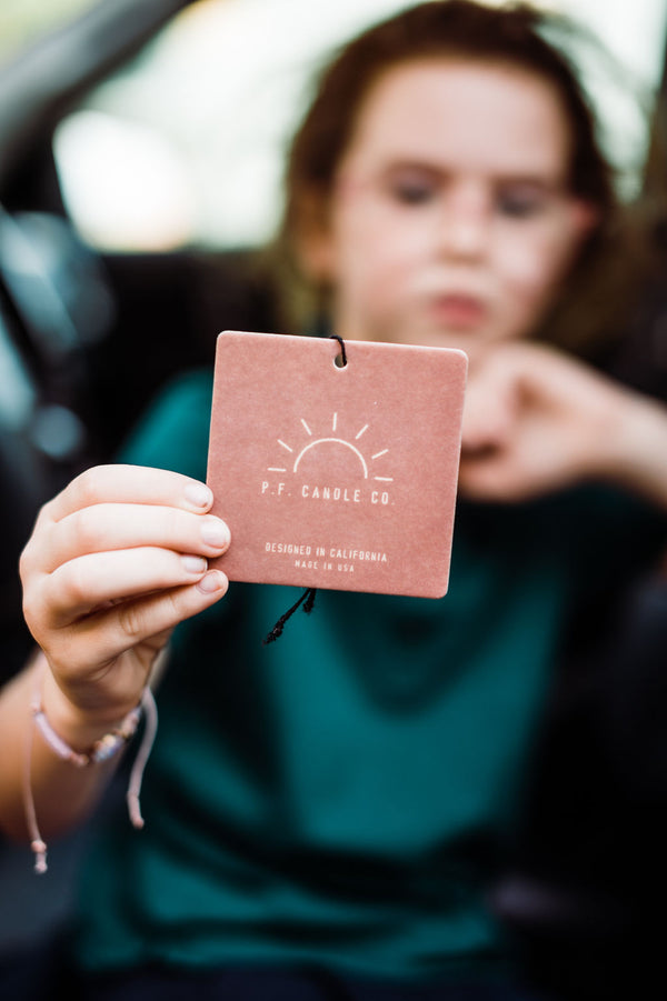 Paperboard car fragrance, air freshener in fragrance teakwood + tobacco. | Paraben-free || you can shop now at  shop.rambleandcompany.com or visit our storefront in downtown Wichita Falls, Texas || small batch + hand printed tees | home goods | paper goods | gifts + more