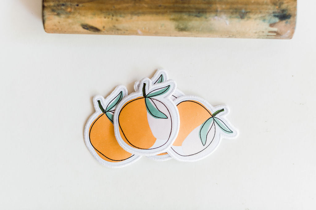 So many possibilities + ways to use these Ramble & Co. patches. multi-color hand illustrated peach the color: peach, pink, white, black and green approx. 2" x 2" To apply: Each patch is woven with an iron on backing. Ramble & Co. is a family owned business. Shop at shop.rambleandcompany.com or visit our store in Wichita Falls, Texas || small batch/ hand printed tees + fine art prints | your source of encouragement + inspiration.